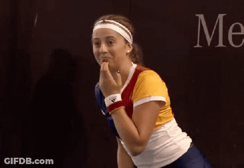 Woman With Headband And Adidas Wristbands Holding Hands Saying Me GIF