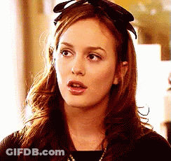 Woman With Headband And Black Shirt GIF
