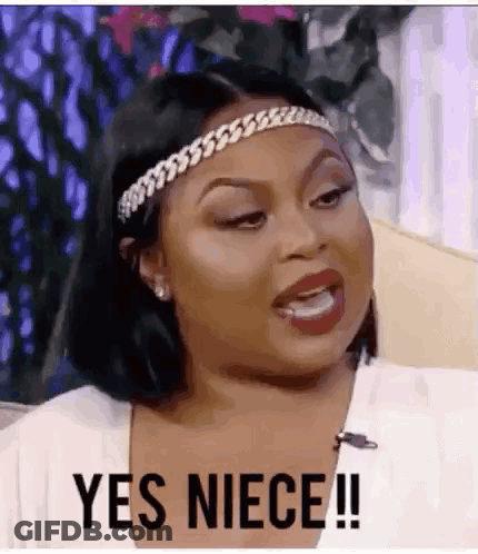 Woman With Headband On Couch Says Yes Niece GIF