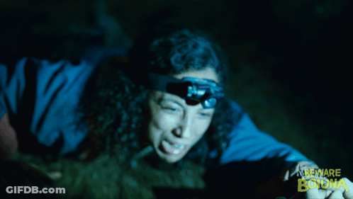 Woman With Headlamp Saying Beware Bona GIF