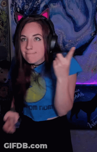 Woman With Headphones And Blue Shirt From Nom GIF
