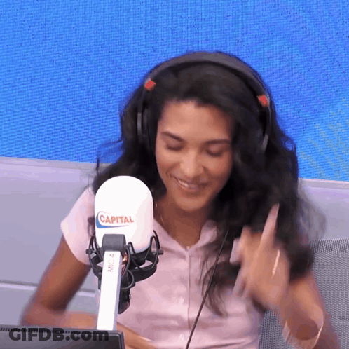 Woman With Headphones And Capital Microphone GIF
