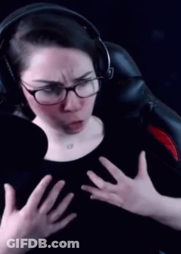 Woman With Headphones And Glasses Making Funny Face GIF