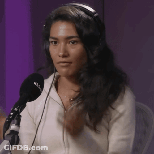 Woman With Headphones And Microphone Saying Music GIF
