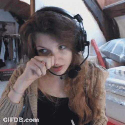 Woman With Headphones And Microphone Wiping Face GIF
