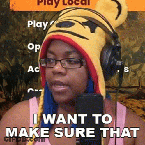 Woman With Headphones And Pooh Hat On Mic GIF