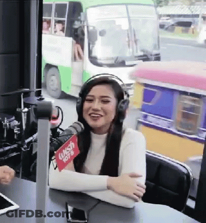 Woman With Headphones At Microphone Wish 107.9 GIF