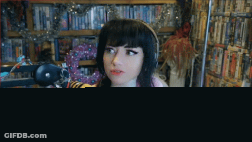 Woman With Headphones At Microphone GIF