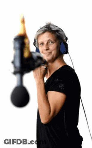 Woman With Headphones Holding Microphone GIF