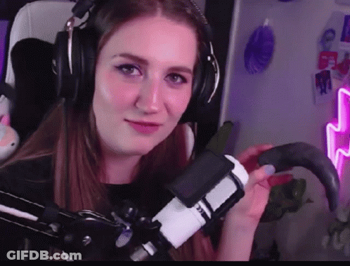 Woman With Headphones Holding Microphone GIF
