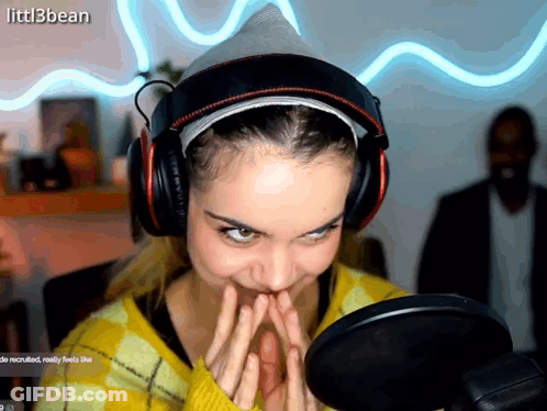 Woman With Headphones Making Funny Face At Microphone Littl3bean GIF
