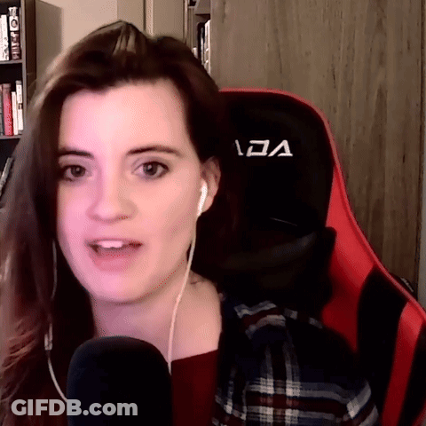 Woman With Headphones On Red And Black Chair Letter A GIF