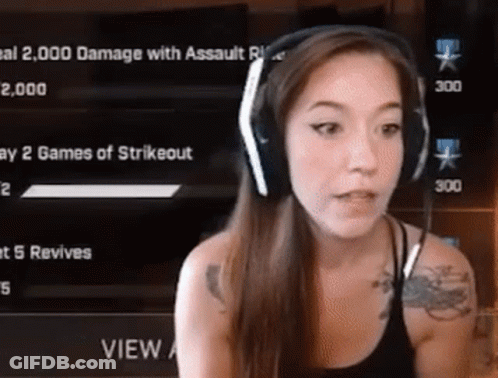 Woman With Headphones Playing Video Game GIF