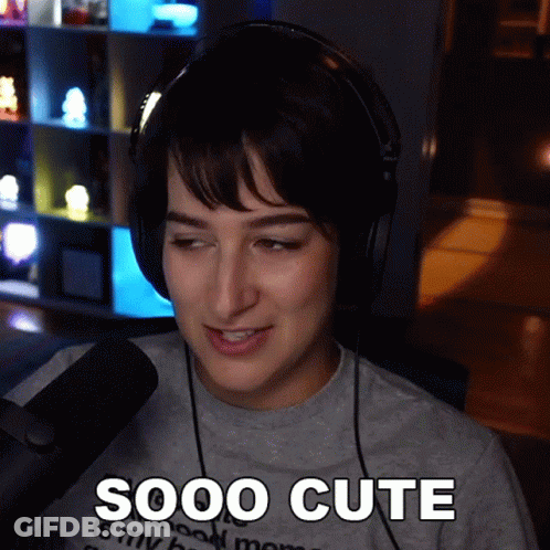 Woman With Headphones Saying Sooo Cute GIF