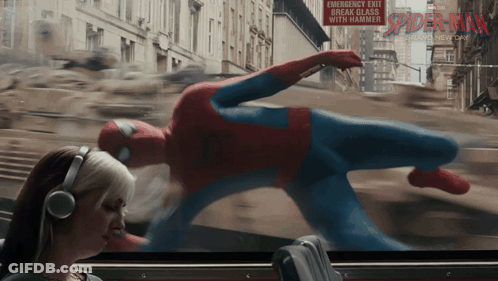 Woman With Headphones Watching Spider-Man Advertisement GIF