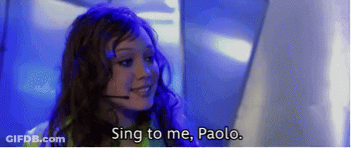 Woman With Headset Singing To Man GIF