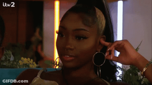Woman With Hoop Earrings And Ponytail ITV 2 GIF