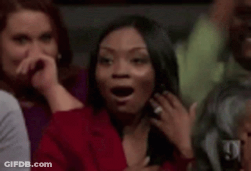 Woman With Hoop Earrings Looking Out Car Window GIF