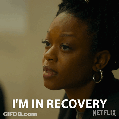 Woman With Hoop Earrings Says I'm In Recovery GIF