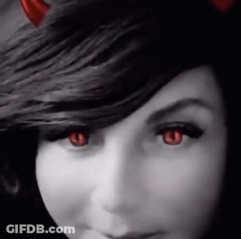 Woman With Horns And Red Eyes GIF