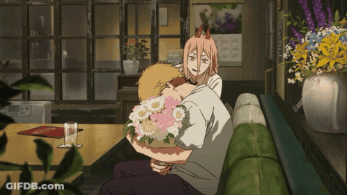 Woman With Horns Holding Bouquet GIF