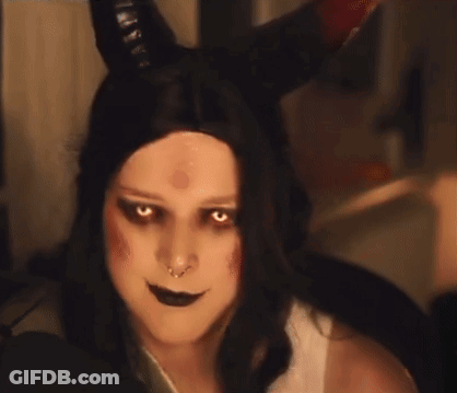 Woman With Horns Making Devil Face Pointing Up GIF