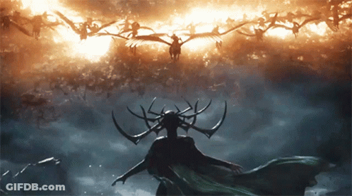 Woman With Horns Standing In Front Of Flock Of Birds Flying In Sky GIF