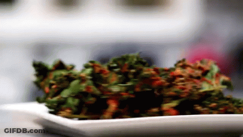 Woman With Kale Chips On Nose GIF