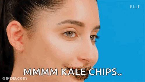 Woman With Kale Chips On Nose GIF