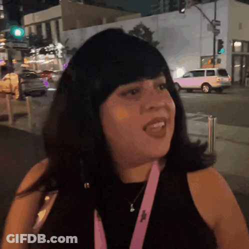 Woman With Lanyard Saying I Love You GIF