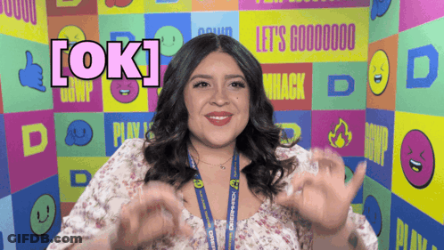 Woman With Lanyard Saying OK GIF