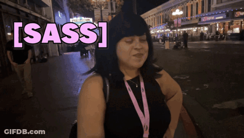 Woman With Lanyard Saying Sass GIF