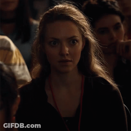 Woman With Lanyard Smiling GIF