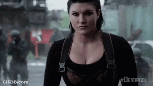 Woman With Large Breasts Standing GIF