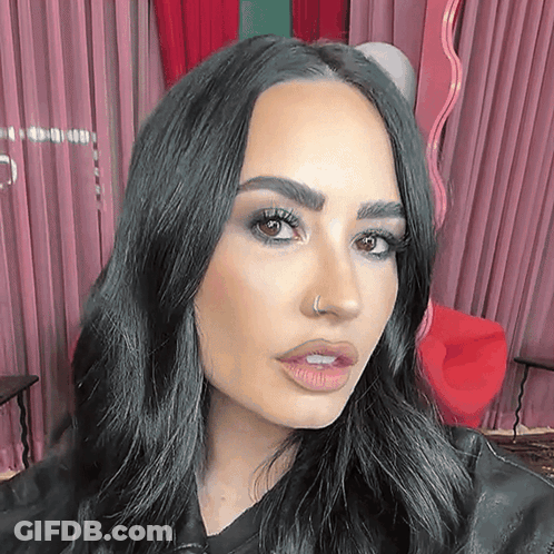 Woman With Long Black Hair And Nose Ring GIF