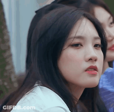 Woman With Long Black Hair And Red Lips GIF