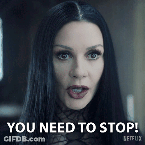 Woman With Long Black Hair And Red Lips Says You Need To Stop Netflix GIF