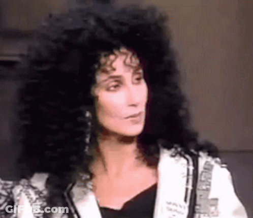 Woman With Long Black Hair And White Jacket GIF