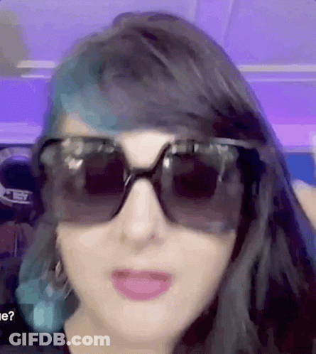 Woman With Long Black Hair In Sheer Top GIF