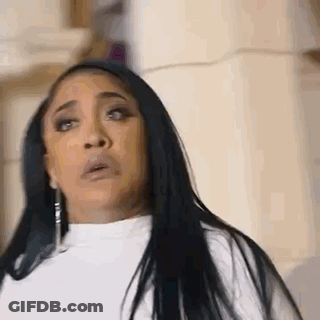 Woman With Long Black Hair In White Sweater And Earrings GIF