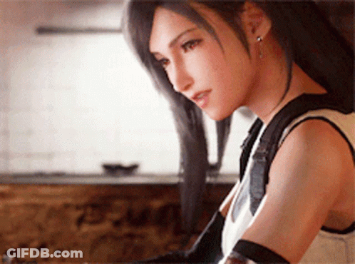 Woman With Long Black Hair In White Tank Top And Black Gloves GIF