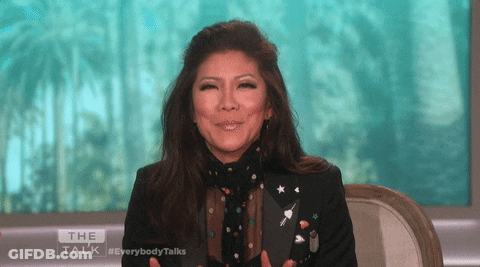 Woman With Long Black Hair Looking At Camera GIF