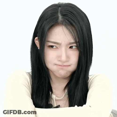 Woman With Long Black Hair Making Face GIF