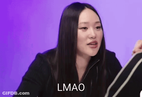 Woman With Long Black Hair Making Funny Face GIF