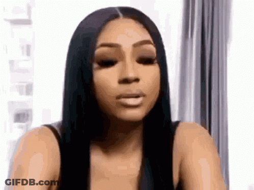 Woman With Long Black Hair Making Funny Face GIF