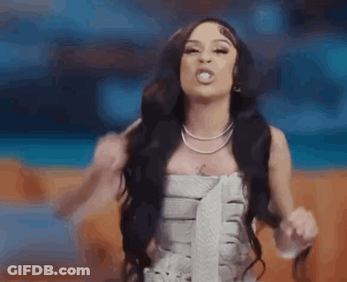 Woman With Long Black Hair Making Funny Face GIF