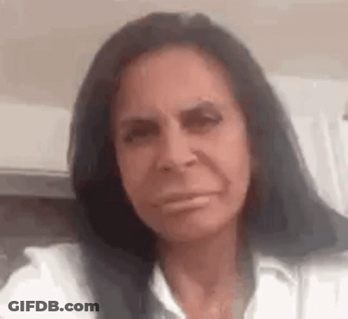 Woman With Long Black Hair Making Funny Face GIF