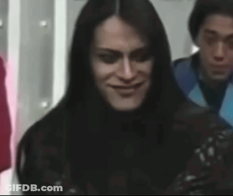 Woman With Long Black Hair Making Funny Face GIF