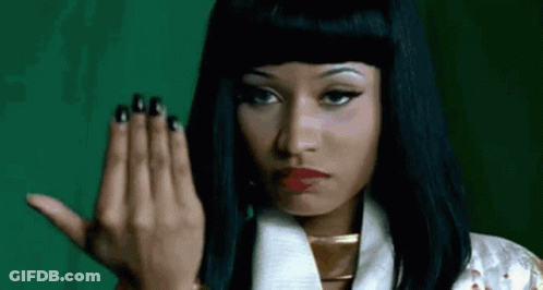 Woman With Long Black Hair Nails Raising Hand GIF