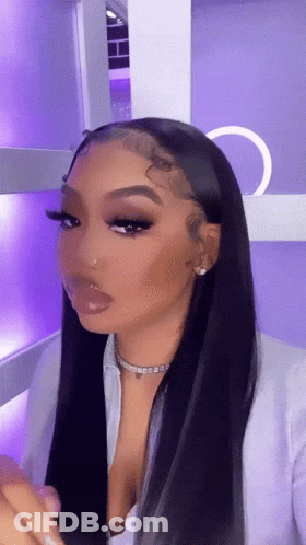 Woman With Long Black Hair, Necklace And Earrings GIF